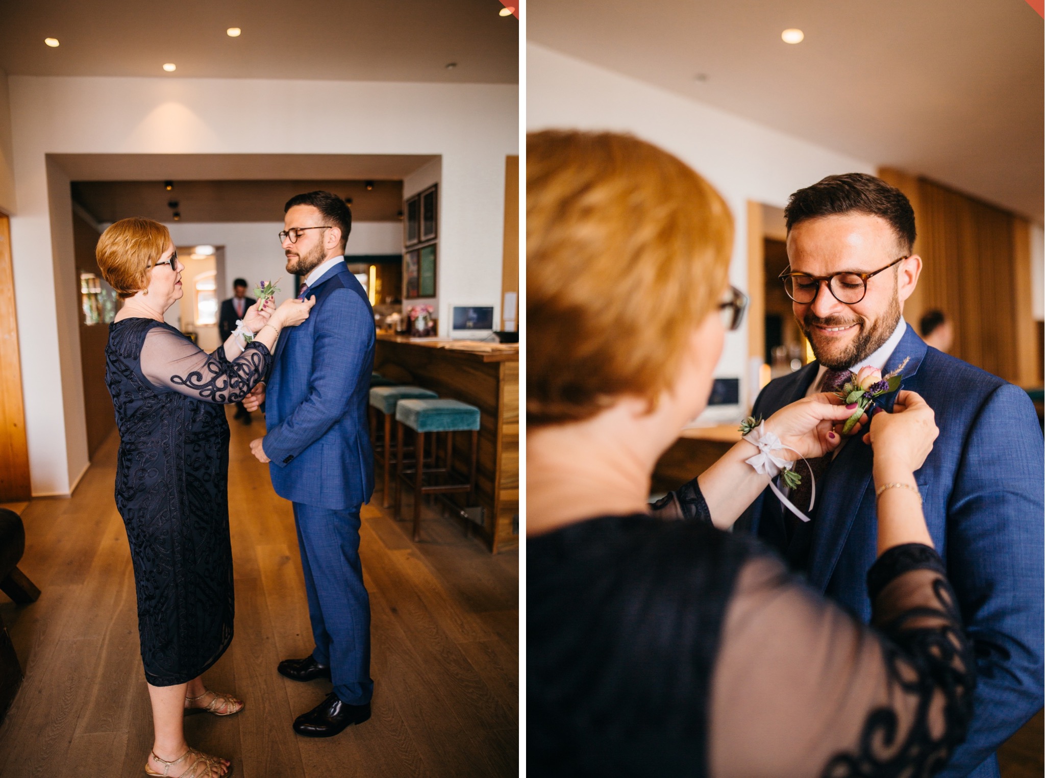 The groom gets help with his boutonniere before the wedding.
