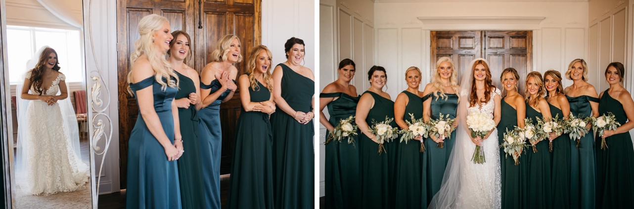 Bridesmaids smile at the bride in full wedding attire. Bride and bridesmaids pose together.