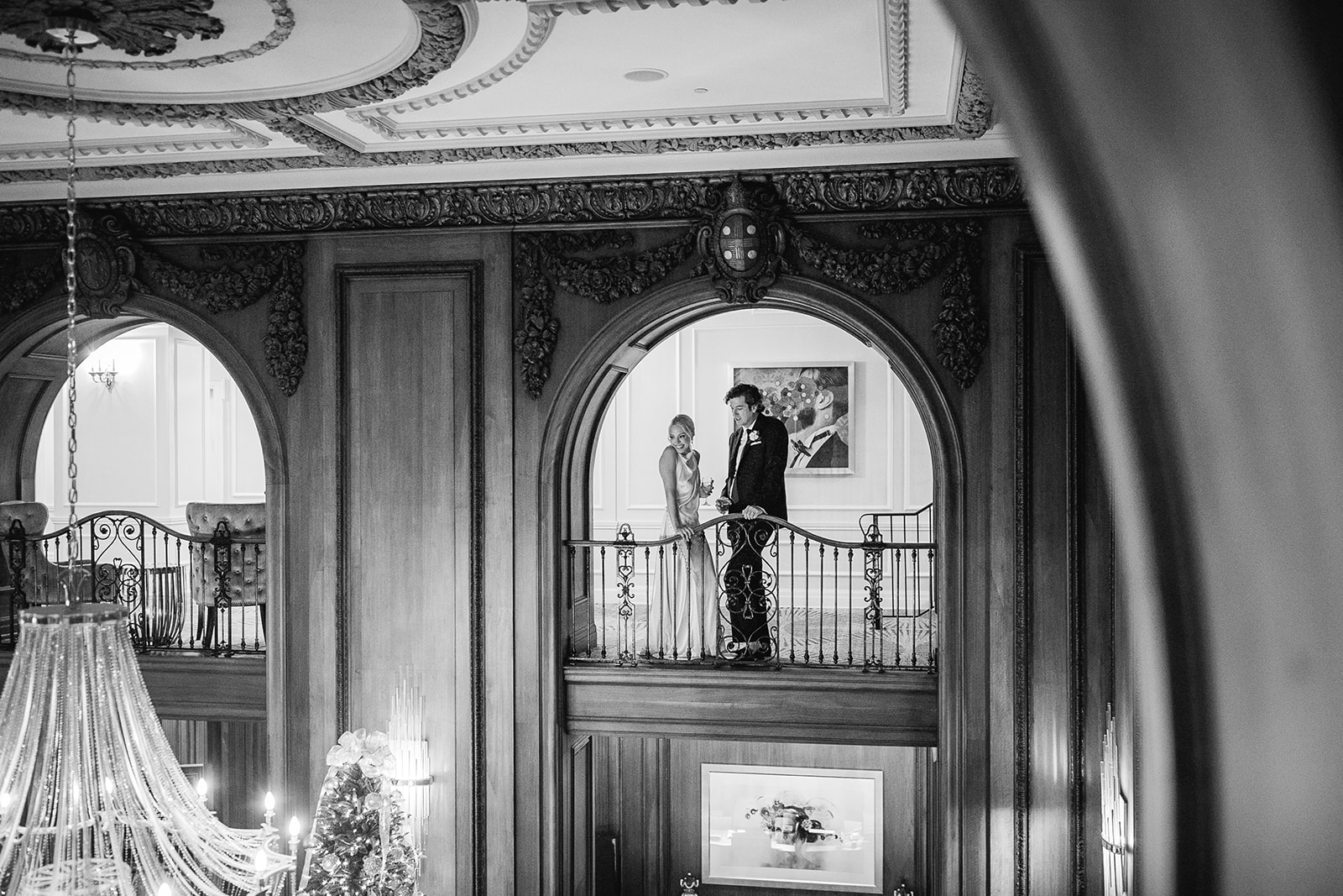 Couple standing on balcony at The Read House wedding venue