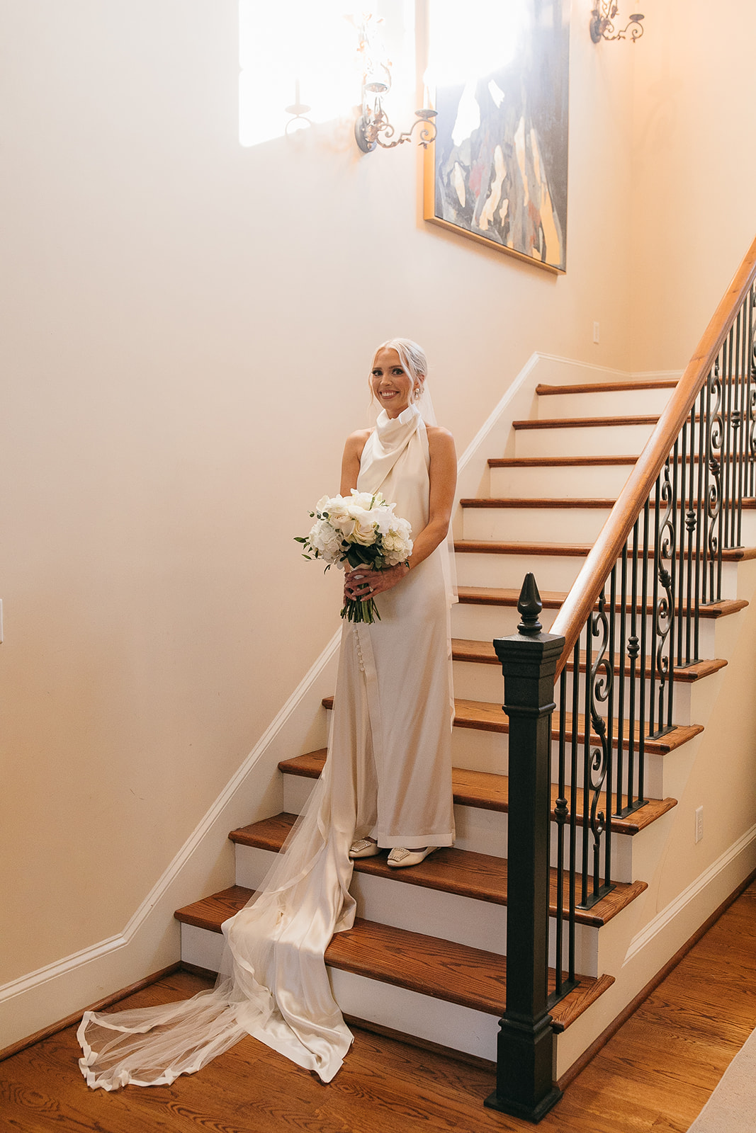 Bride on a staircase for The Read House Wedding venue celebration 