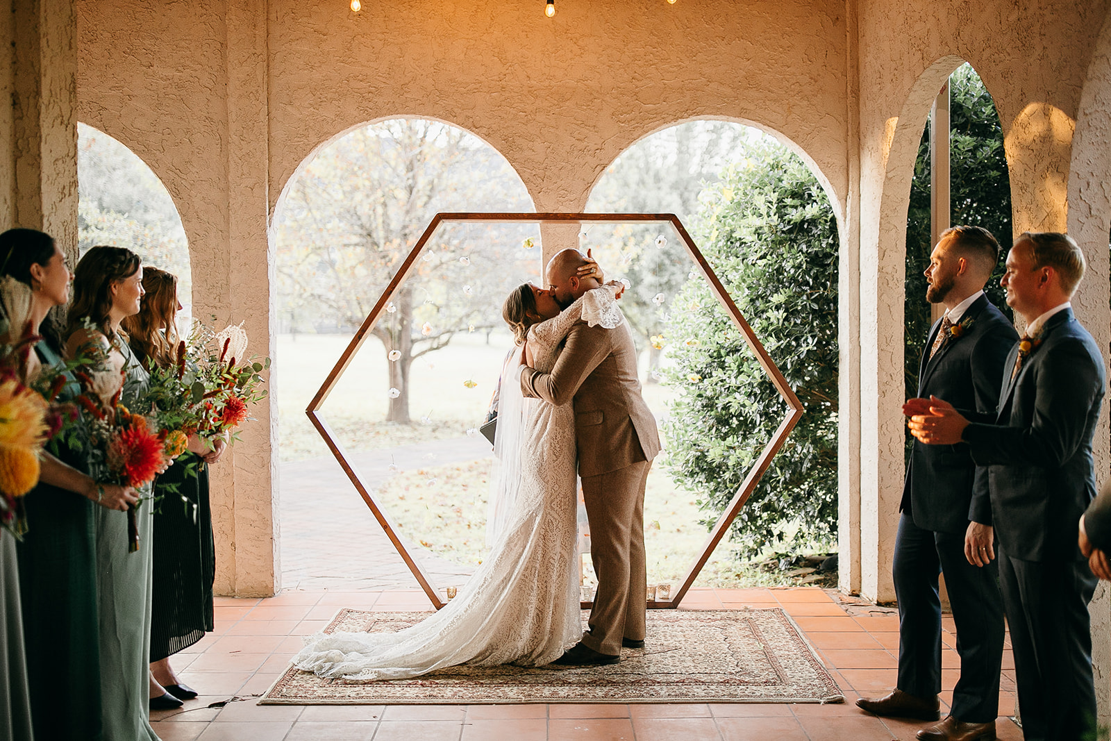 First kiss during a Tennessee River Place wedding ceremony. 