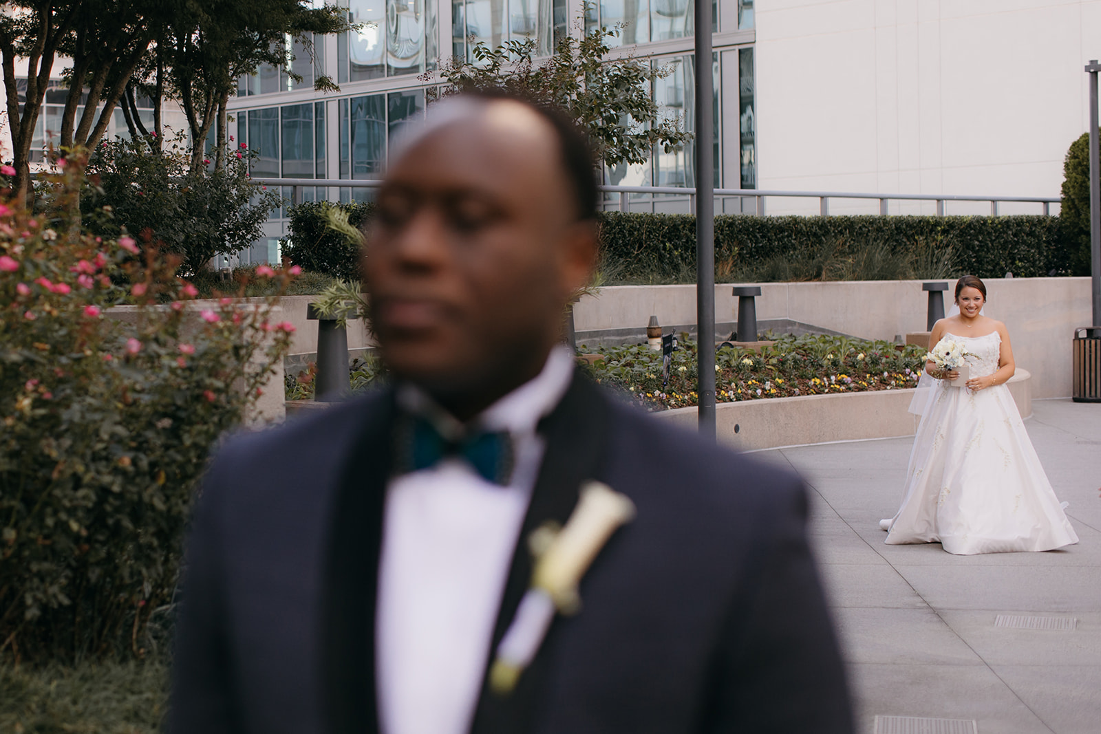 Bride approaching the groom for their first look before the Biltmore Ballroom Atlanta ceremony. 