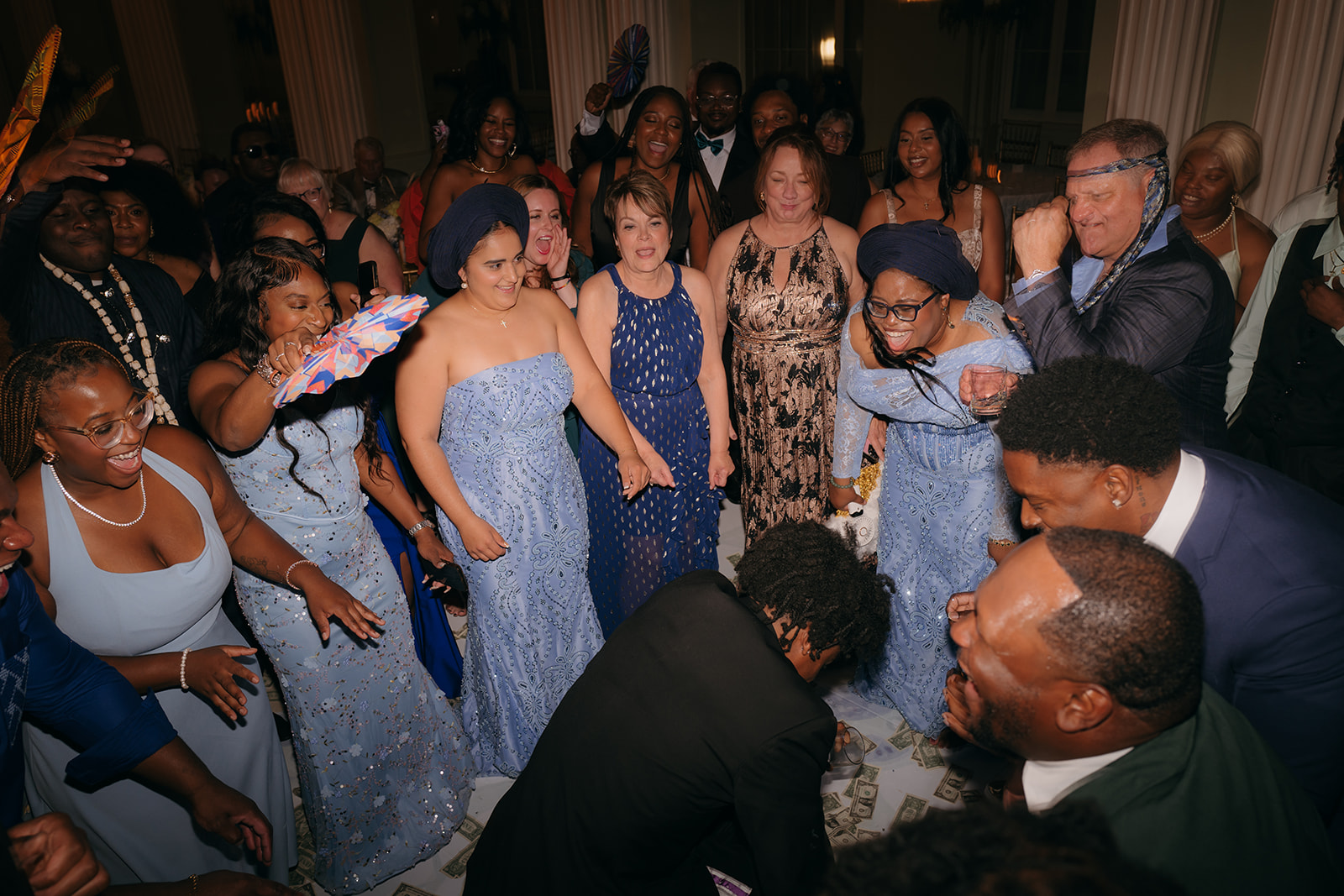 Groom's family dancing during a lively wedding reception at The Biltmore Ballrooms in Atlanta. 