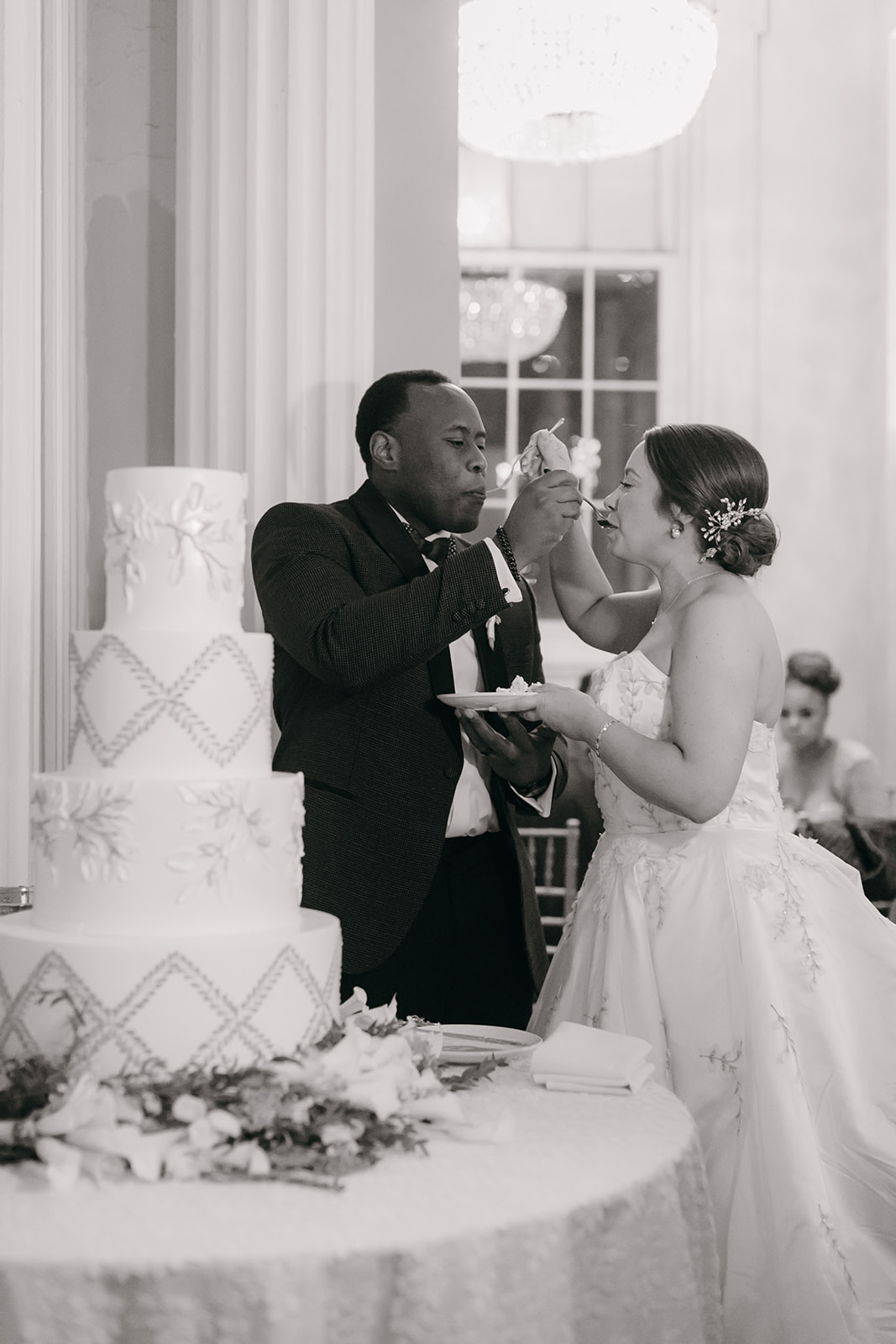 Bride and groom cutting their wedding cake together at the Biltmore Ballrooms in Atlanta GA. 