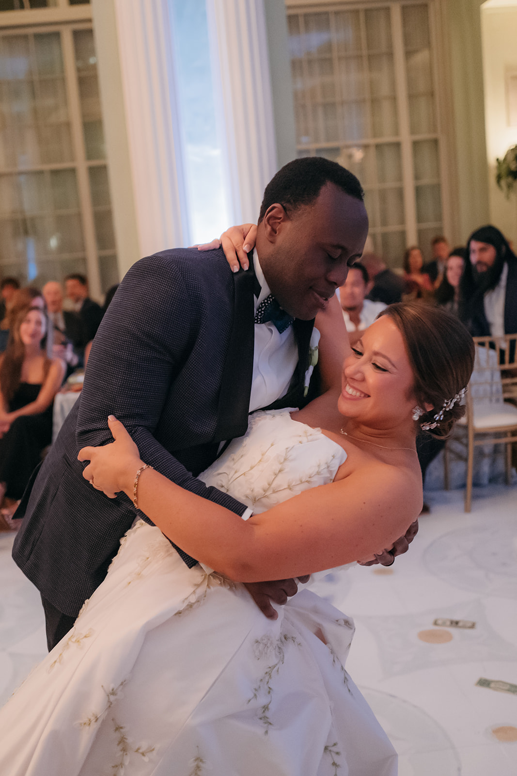 Bride and groom sharing their first dance during a Biltmore Ballroom Atlanta wedding reception. 