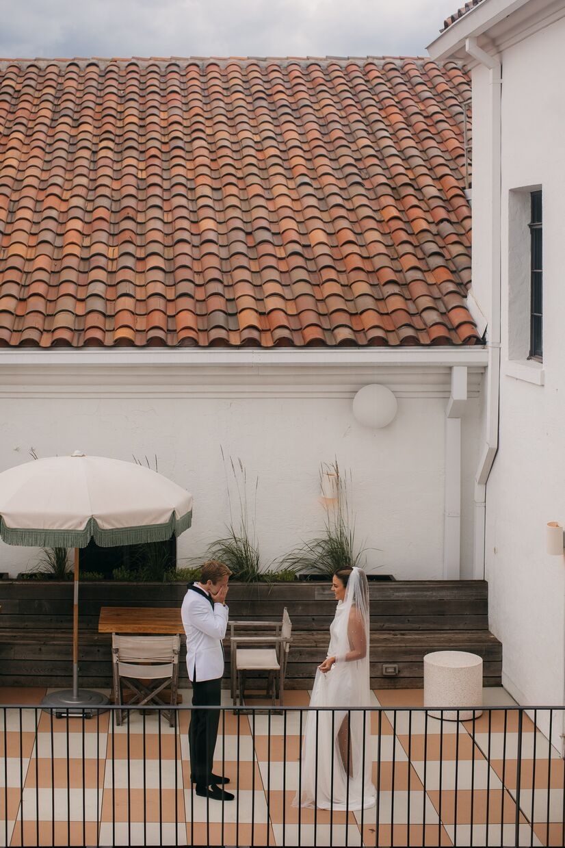 couple having a first look out on the terrace at common house chattanooga