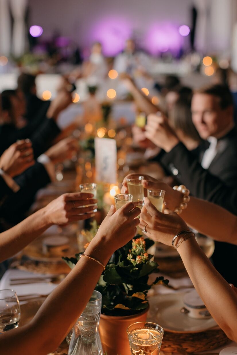 guests at wedding raising glasses at common house chattanooga